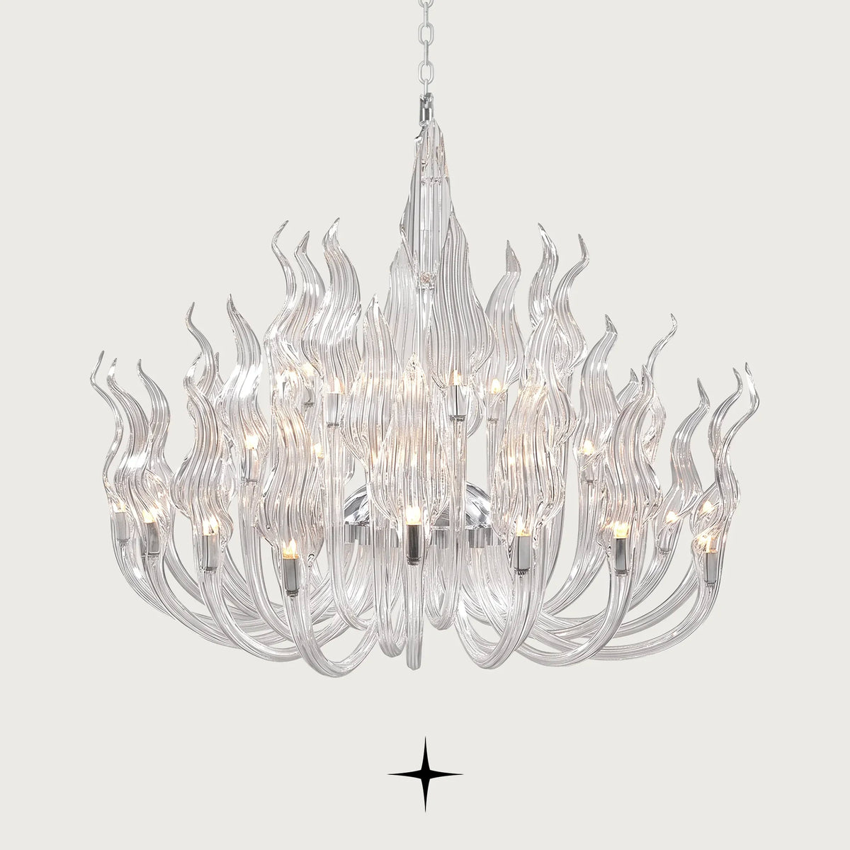 Anastasia glass flame chandelier suspended in a luxury modern dining space
