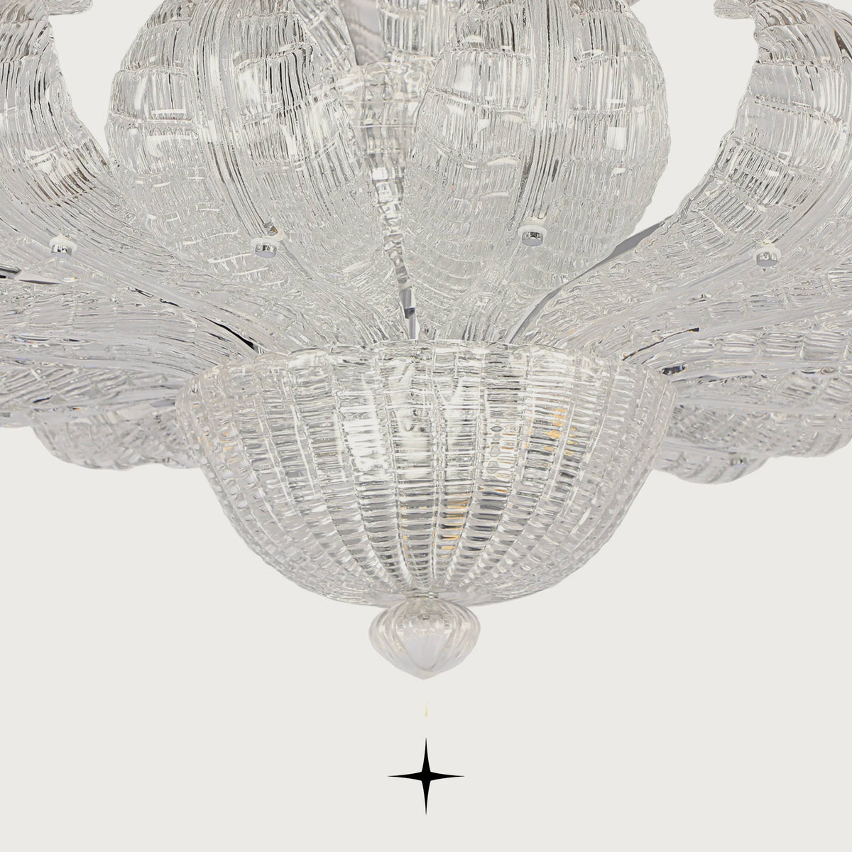 Close-up detail of handcrafted ribbed glass diffusers and bowl on Angelica chandelier