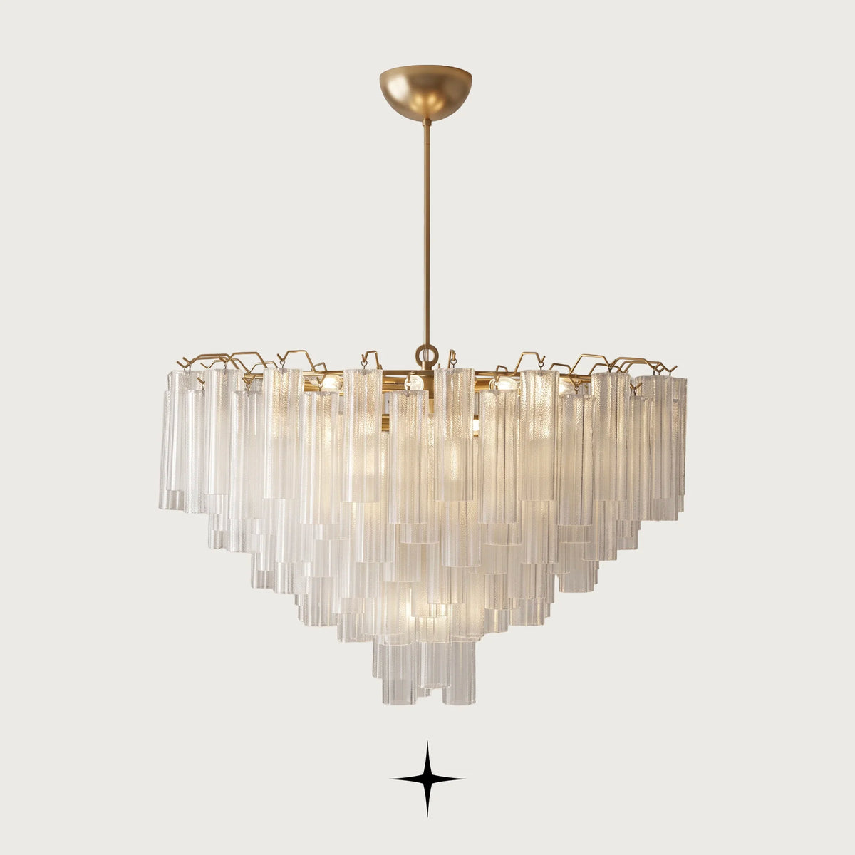 Astra round brass chandelier with cascading fluted ribbed glass tubes on light grey background