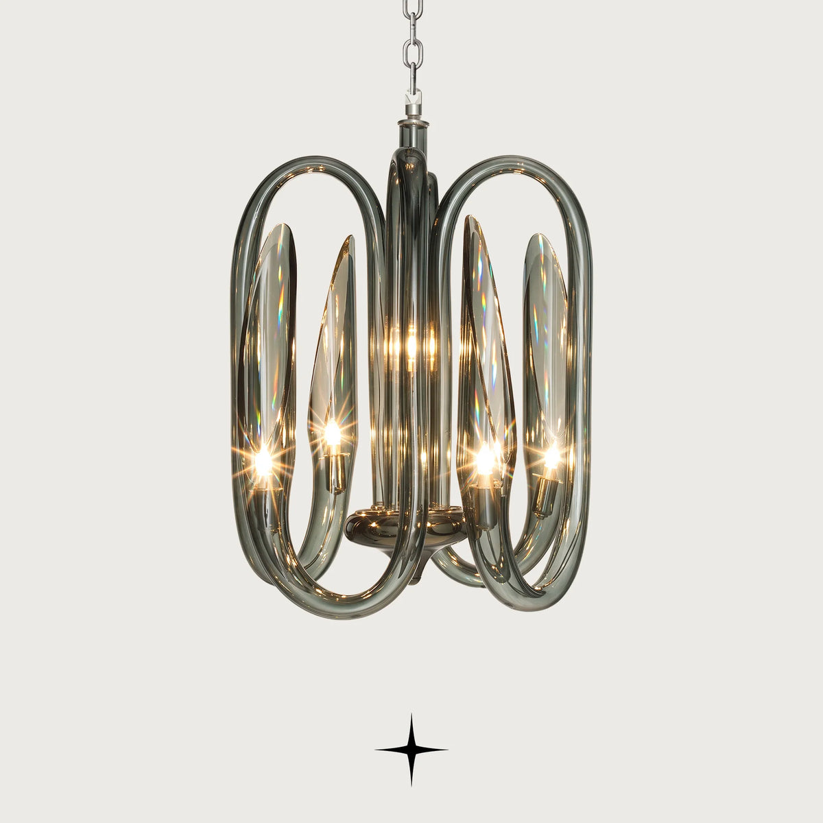 Ava crystal arm chandelier in dark green tinted glass with curved loop design