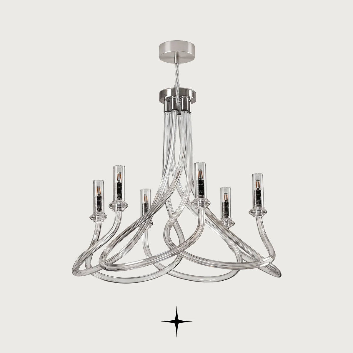 Daisy Chandelier featuring graceful elongated crystal arms in a clear modern design across five sizes