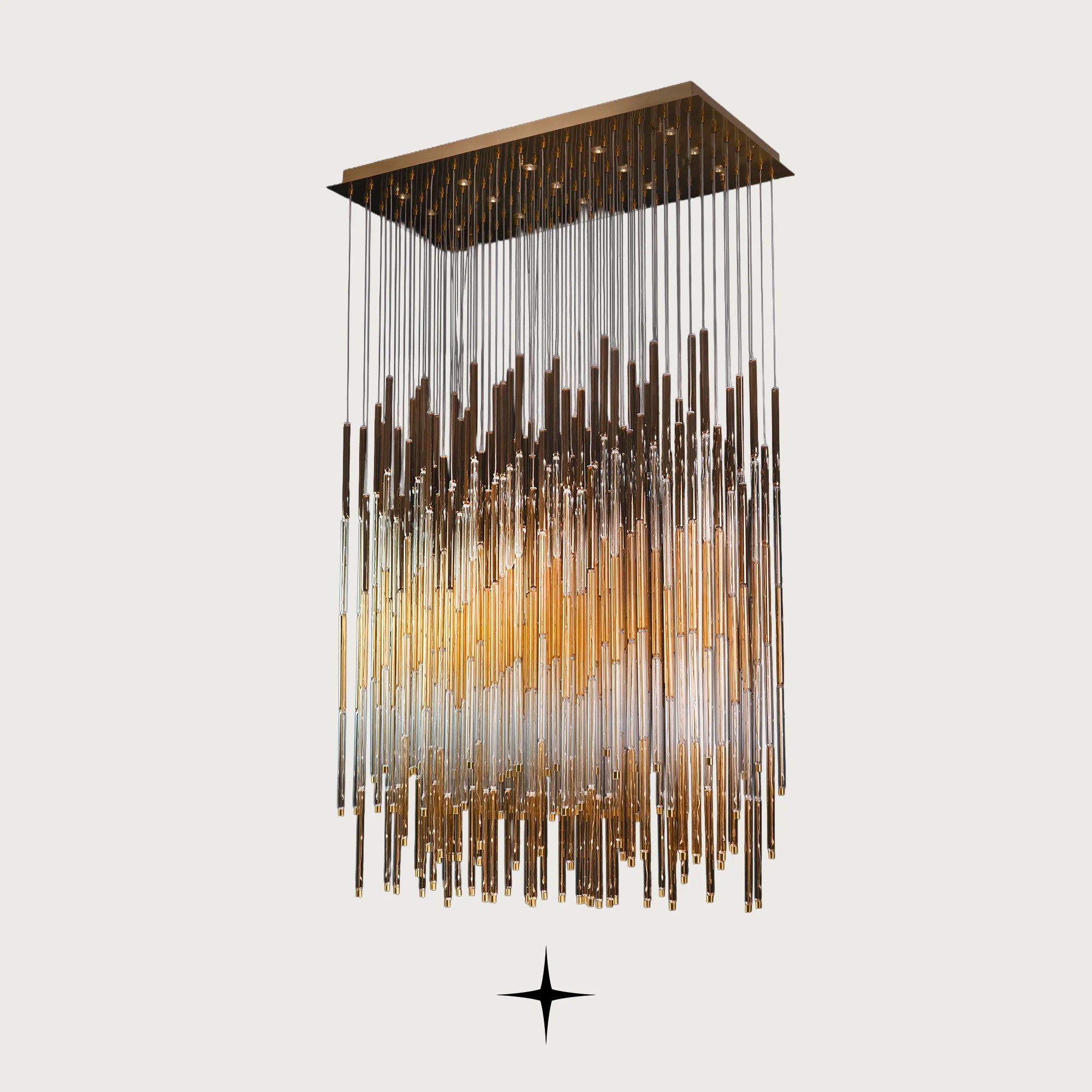 Echo cascading golden glass waterfall chandelier with brass frame on light grey background