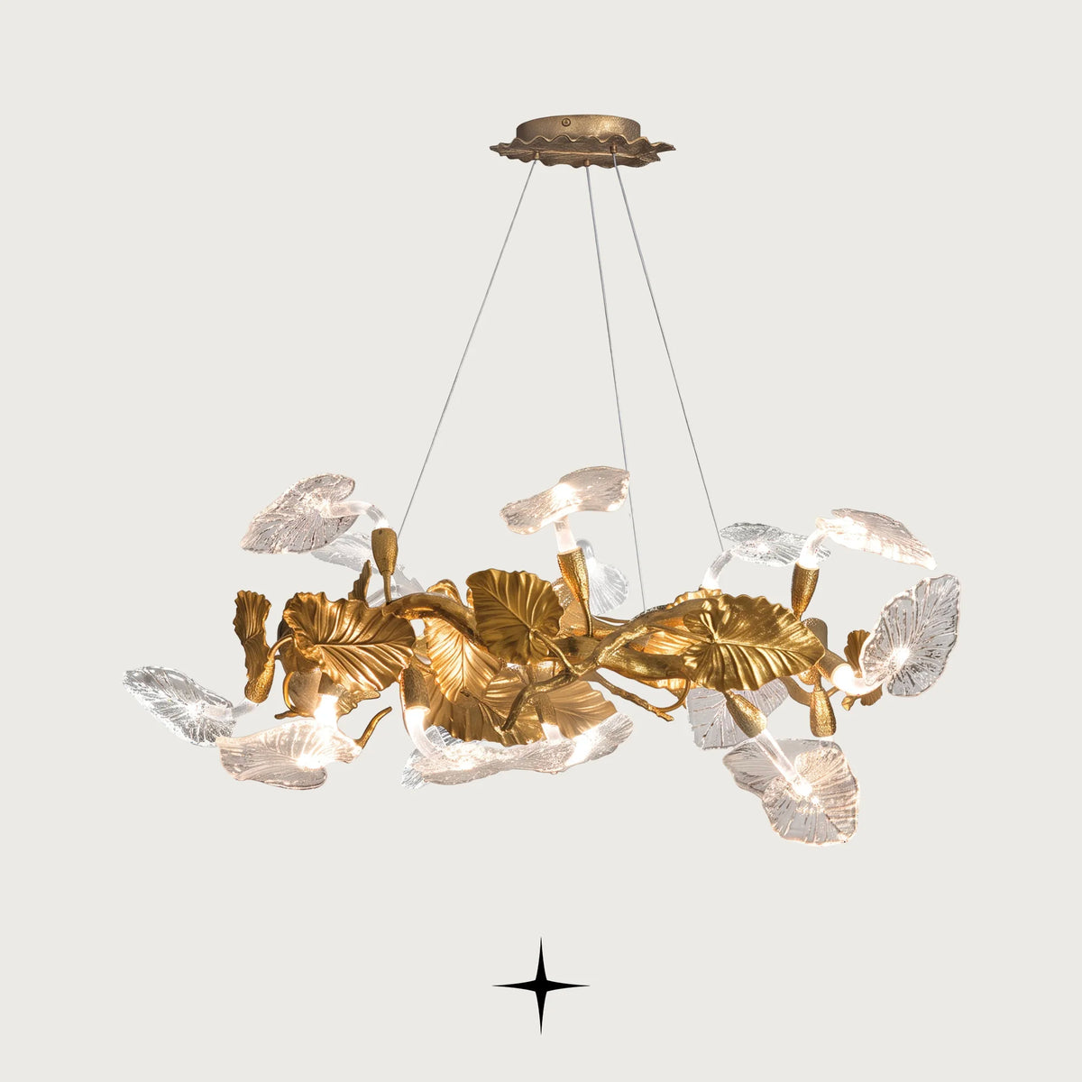 Eldorado luxury chandelier featuring gold branches adorned with clear crystal leaves