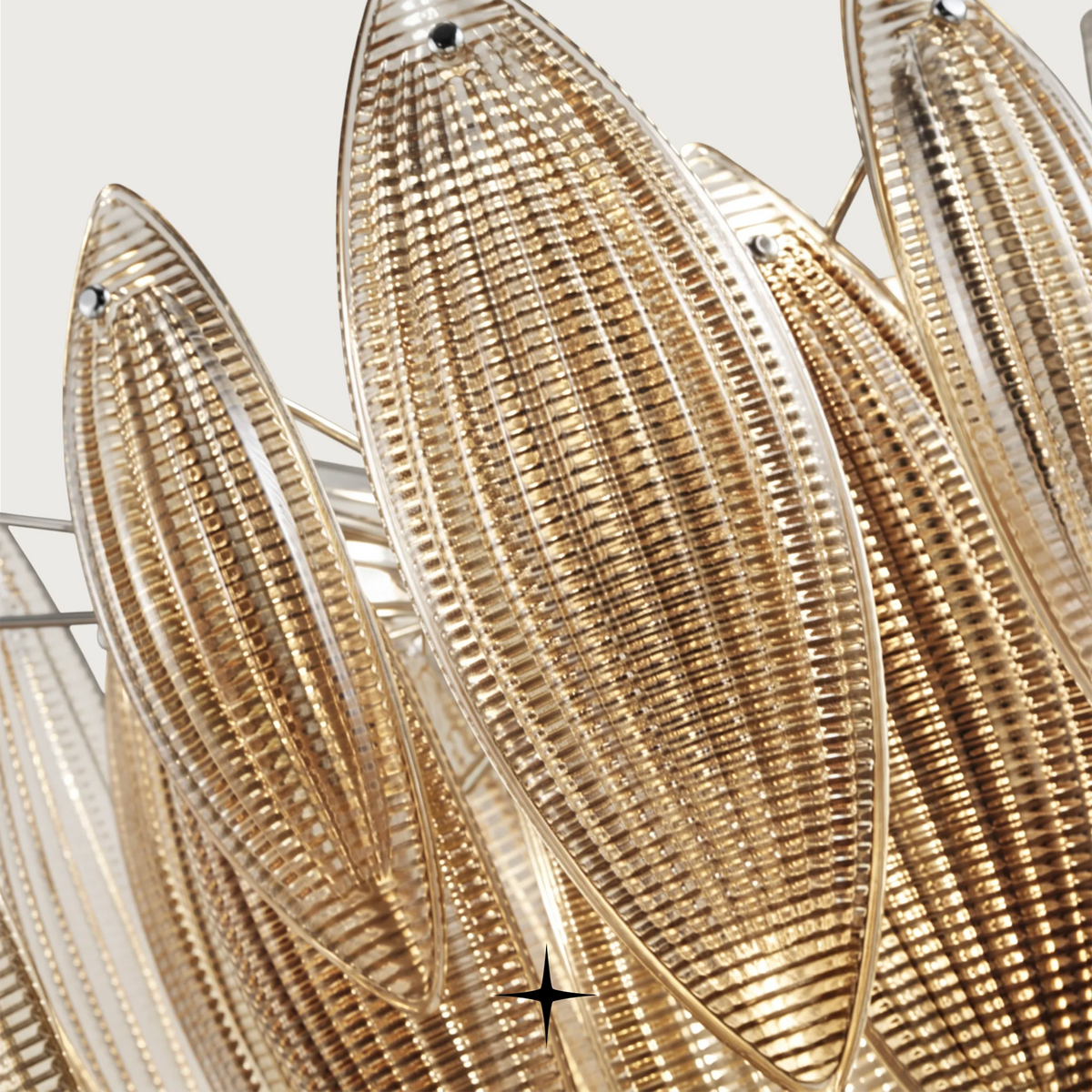 Close up Elegant Lotus luxury circular chandelier featuring amber glass lotus leaves and gold structure