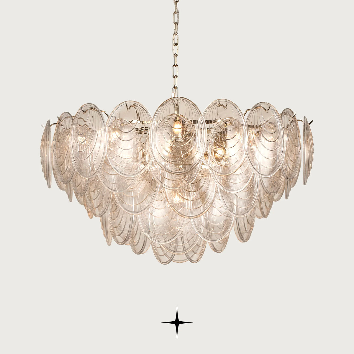 Elegant Moxie oval glass chandelier with golden nickel chain on clean background