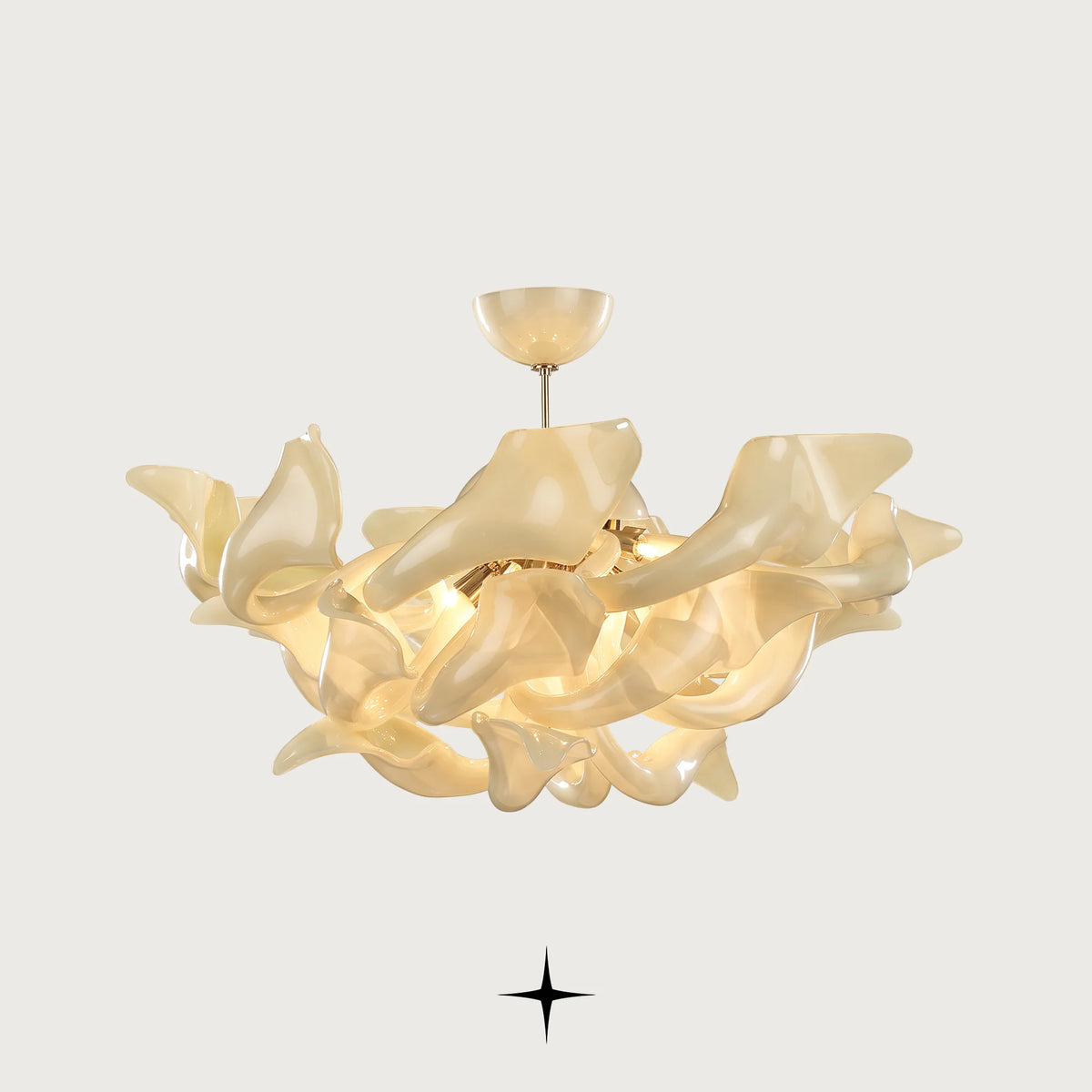 Elegant Naria Chandelier featuring chic elongated golden crystal arms in multi-tier configurations
