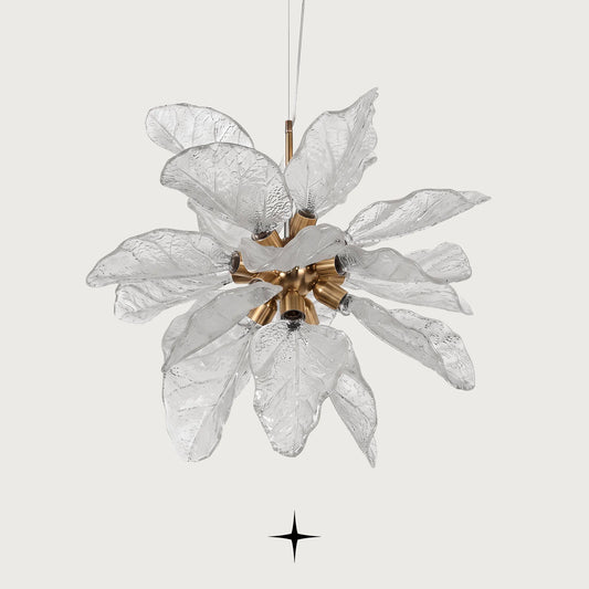 Full front view of Elegant Pristine white glass leaf floral pendant light on light grey backdrop