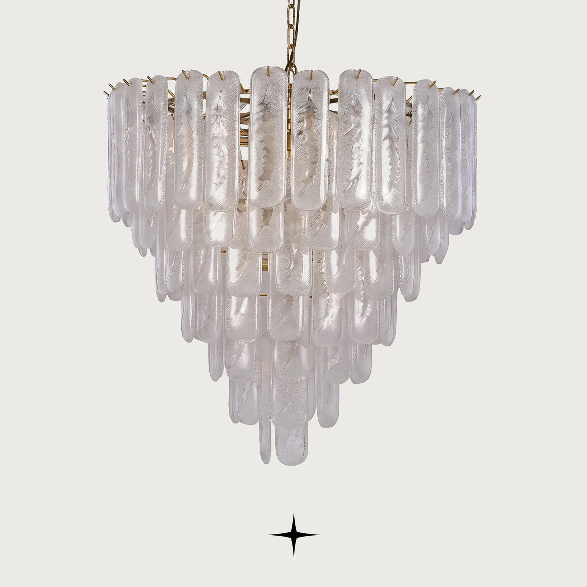 Elena multi-tiered Murano glass block chandelier illuminated on a light grey background