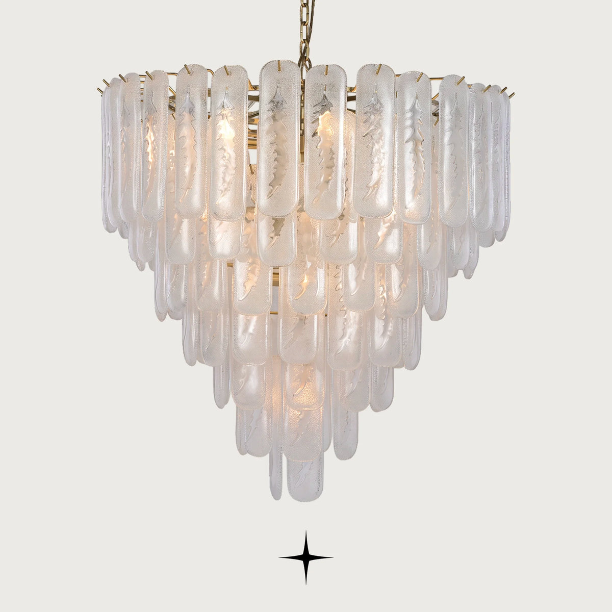 Elena multi-tiered Murano glass block chandelier illuminated on a light grey background