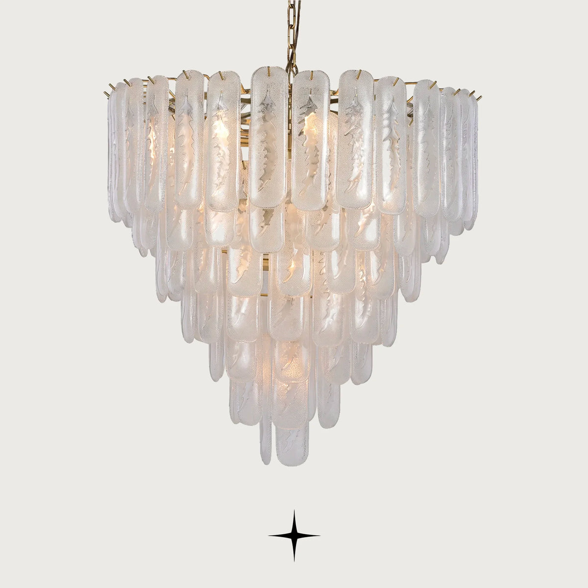 Elena multi-tiered Murano glass block chandelier illuminated on a light grey background