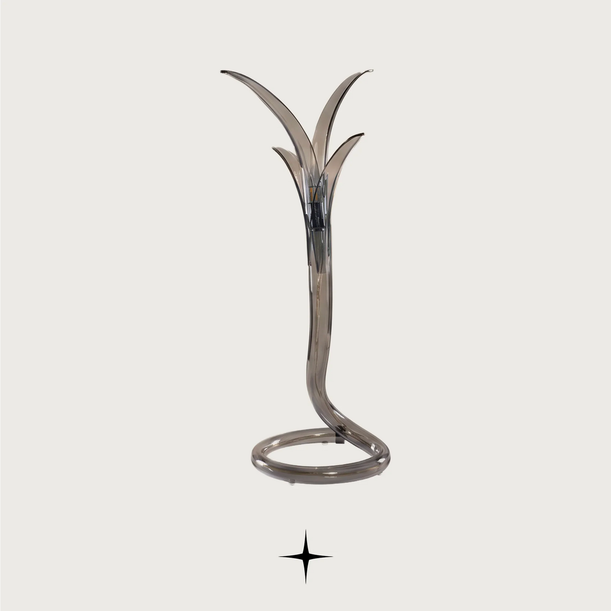 Fable modern luxury table lamp with sleek blue and silver silhouette for sophisticated living spaces.