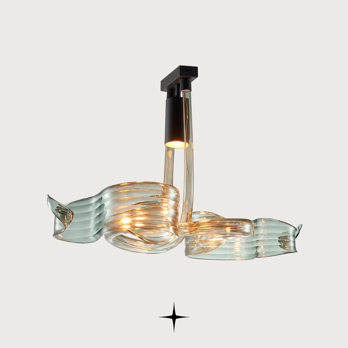Flux modern chandelier featuring fluid green glass loops suspended from black hardware