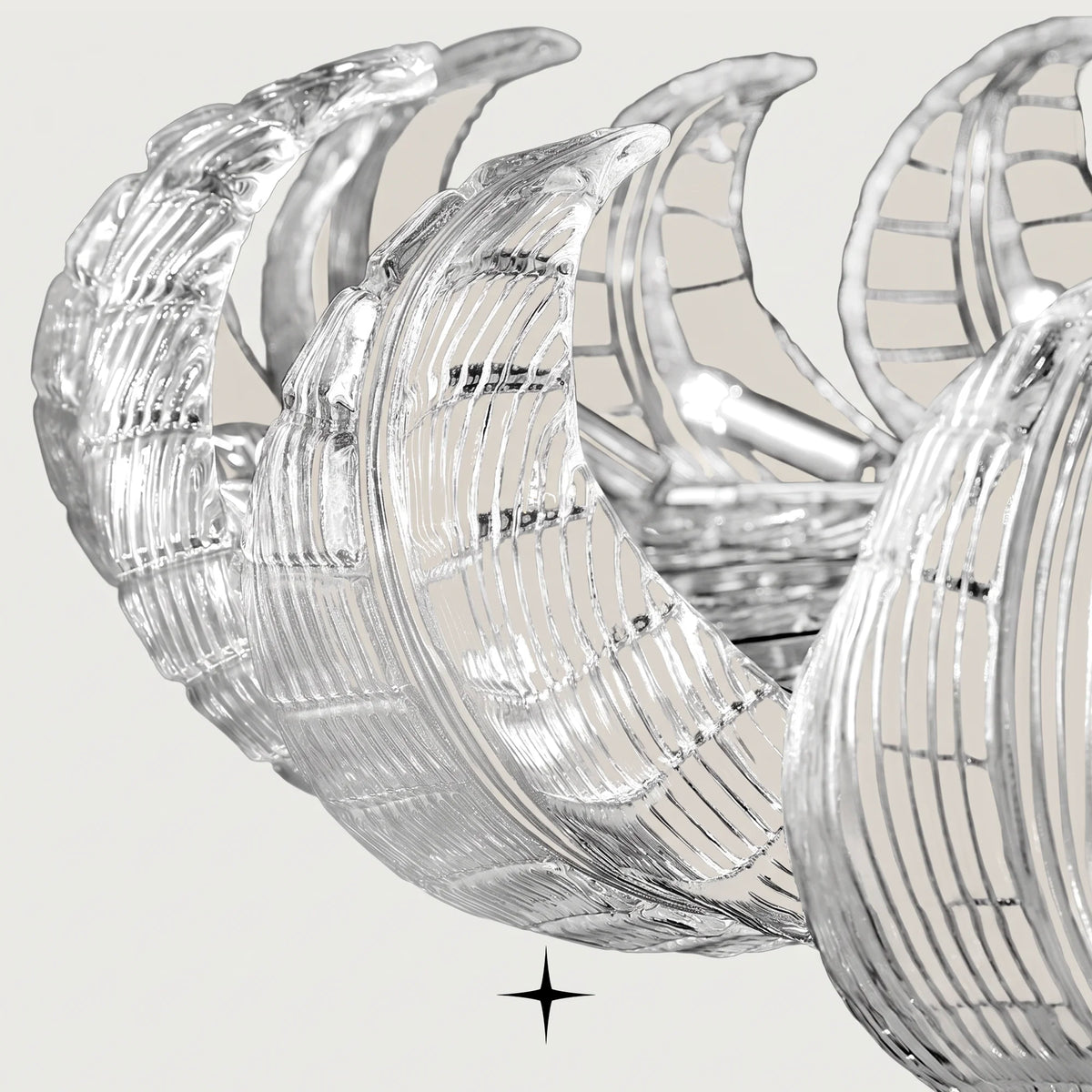 Close-up detail of finely ribbed crystal glass leaf arms on Grand Angelica fixture