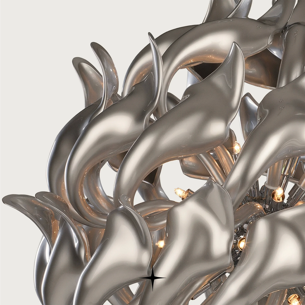 Grand Daria Chandelier featuring chic elongated crystal arms and white or silver rings available in two sizes.