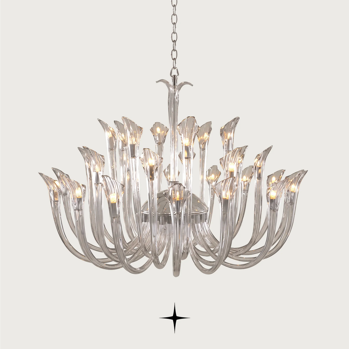 Grand Flare Chandelier featuring sophisticated curves and crystal elements casting enchanting light patterns.