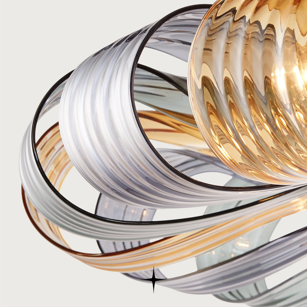 Grand Georgina Chandelier featuring symmetrical crystal artistry and sophisticated matte white and mixed hue options.