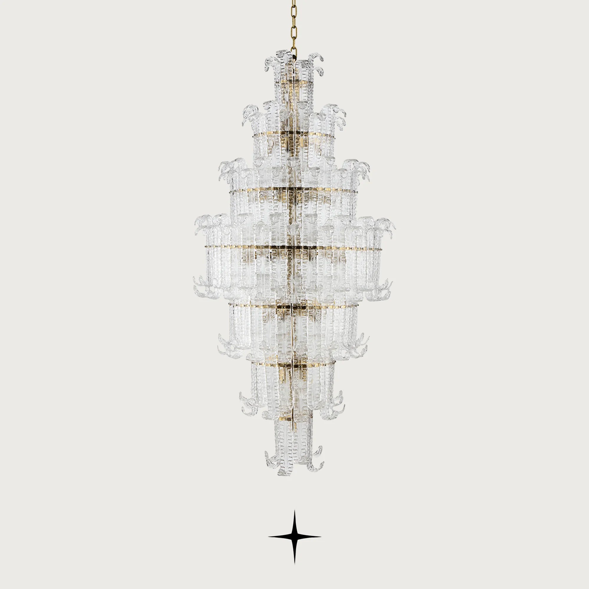 Front view of Grand Montreal tall crystal leaf chandelier on light grey backdrop