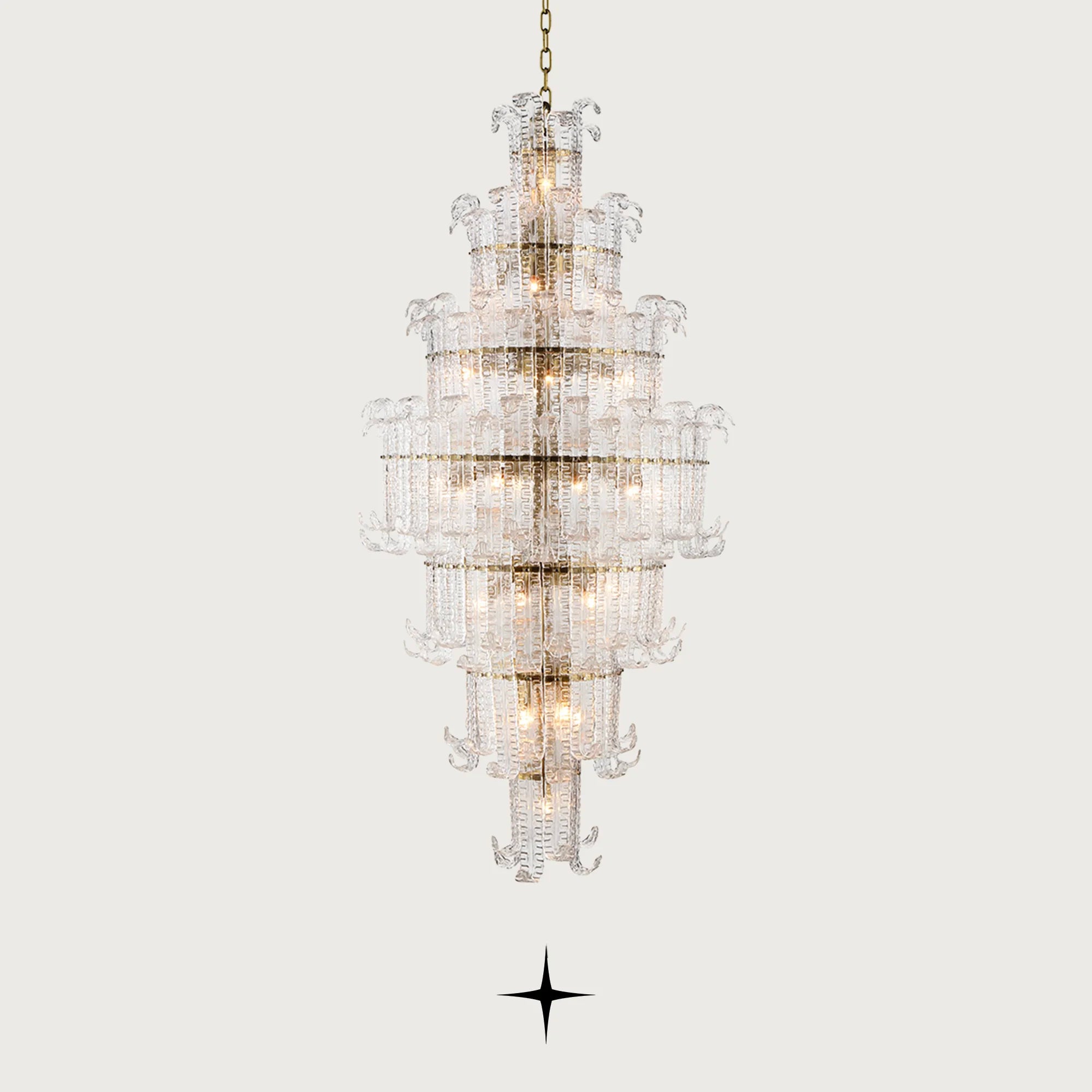 Grand Montreal multi-tiered Murano glass leaf chandelier illuminated on a light grey background