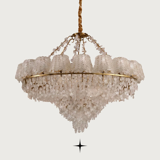 Grand Oslo teardrop Murano-style glass chandelier with golden nickel frame on light grey background