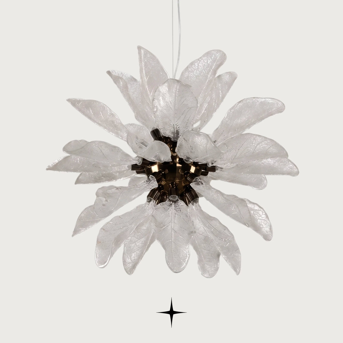 Grand Pristine Murano-style glass leaf chandelier with warm glow on light grey background