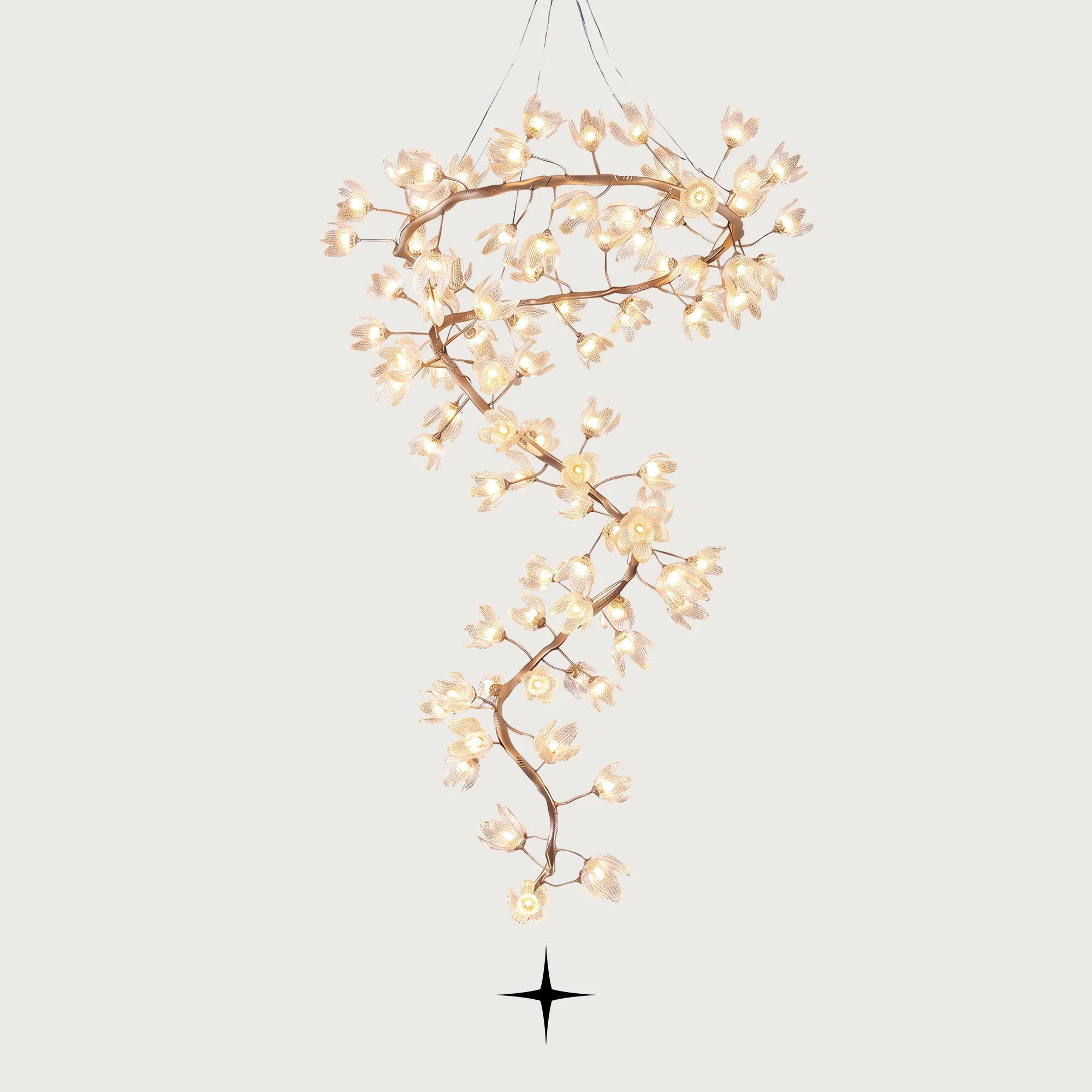 Full view of the Grand Sakura spiral crystal flower chandelier with hand-forged metal branches on a grey background