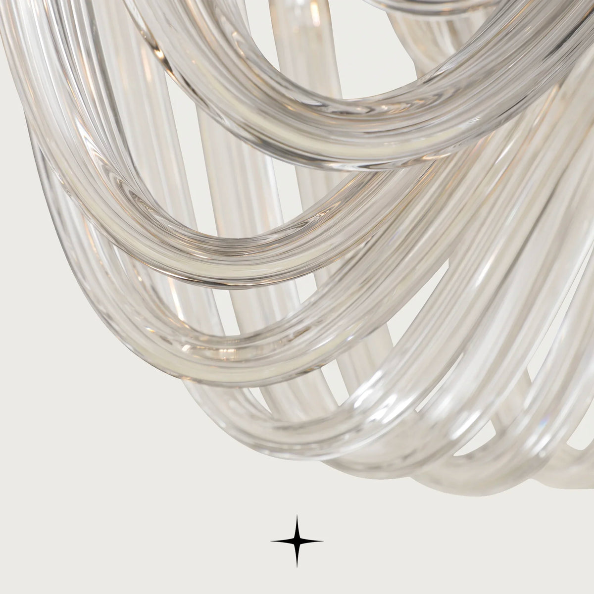 Close-up detail of curved fluid glass tubes on Grand Solara chandelier