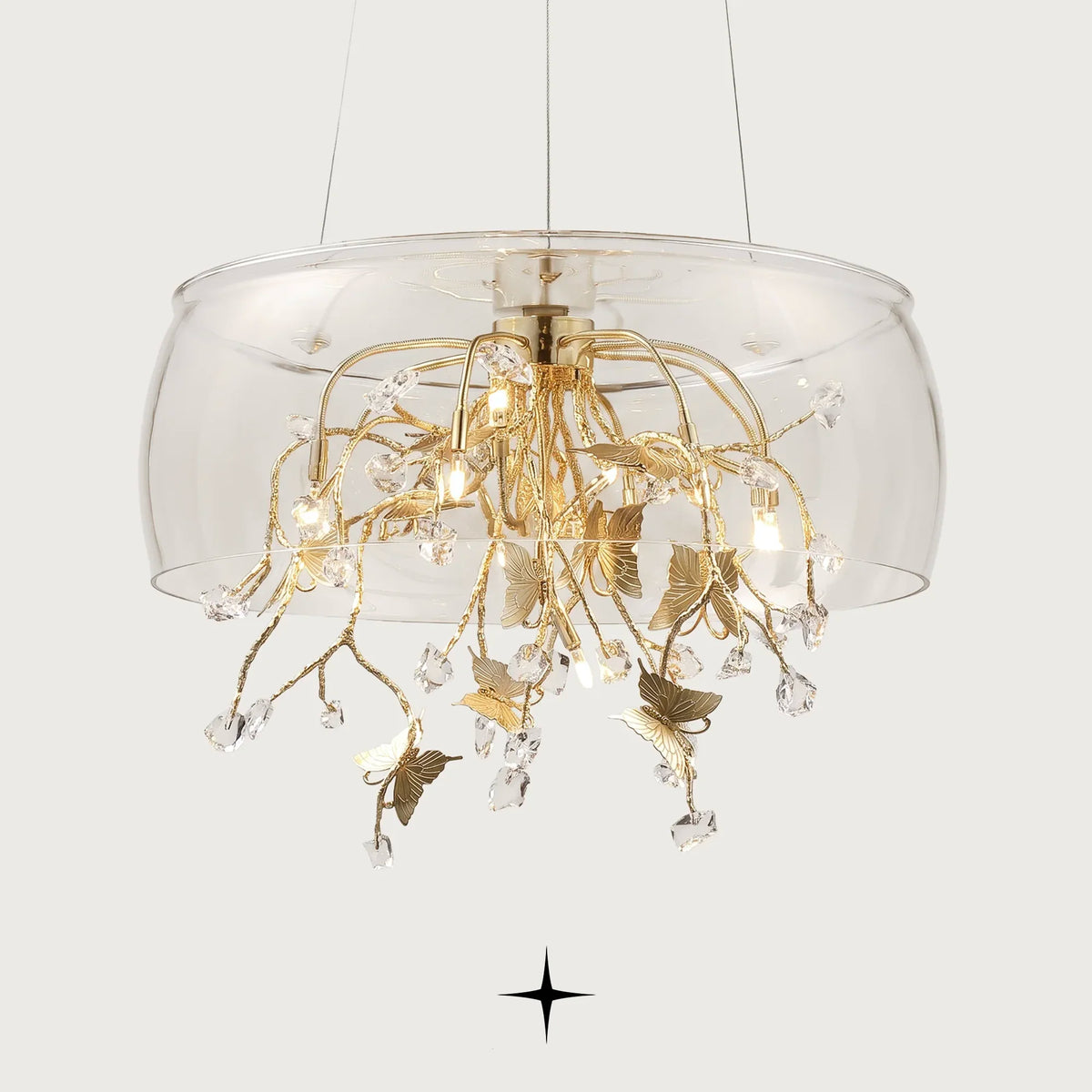 Imagina glass dome chandelier with golden branches, butterflies, and crystal accents on black background