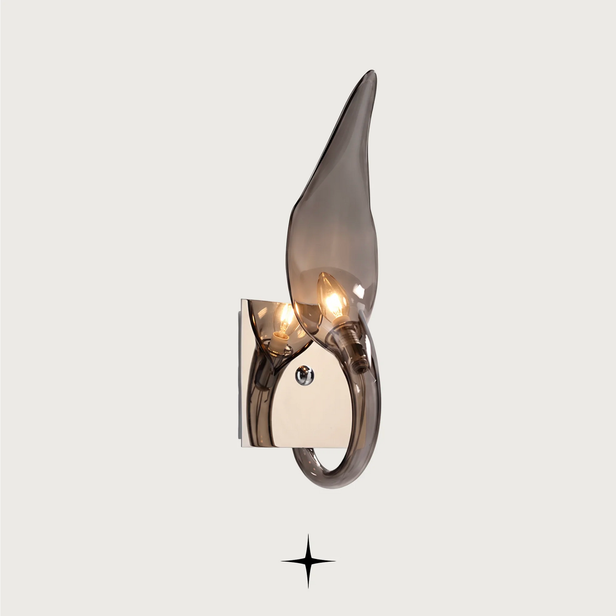 Juliana luxury crystal wall sconce featuring a chic, elongated, and curvaceous Bohemian crystal arm in smoky tones.