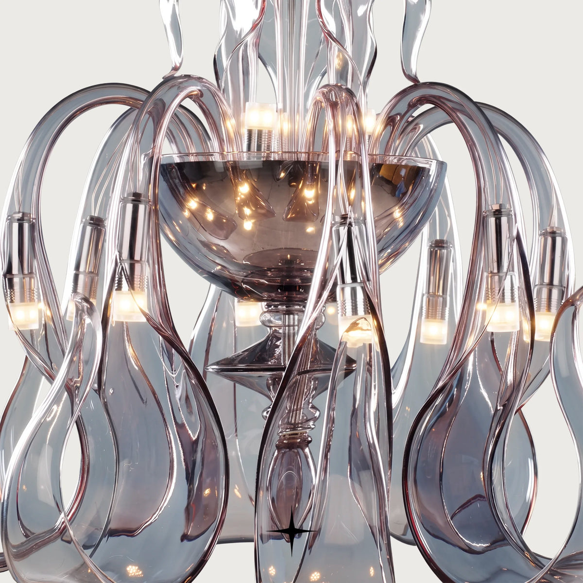 Lavish Matilda Chandelier featuring elongated bohemian crystal arms in vibrant hues across four size variants