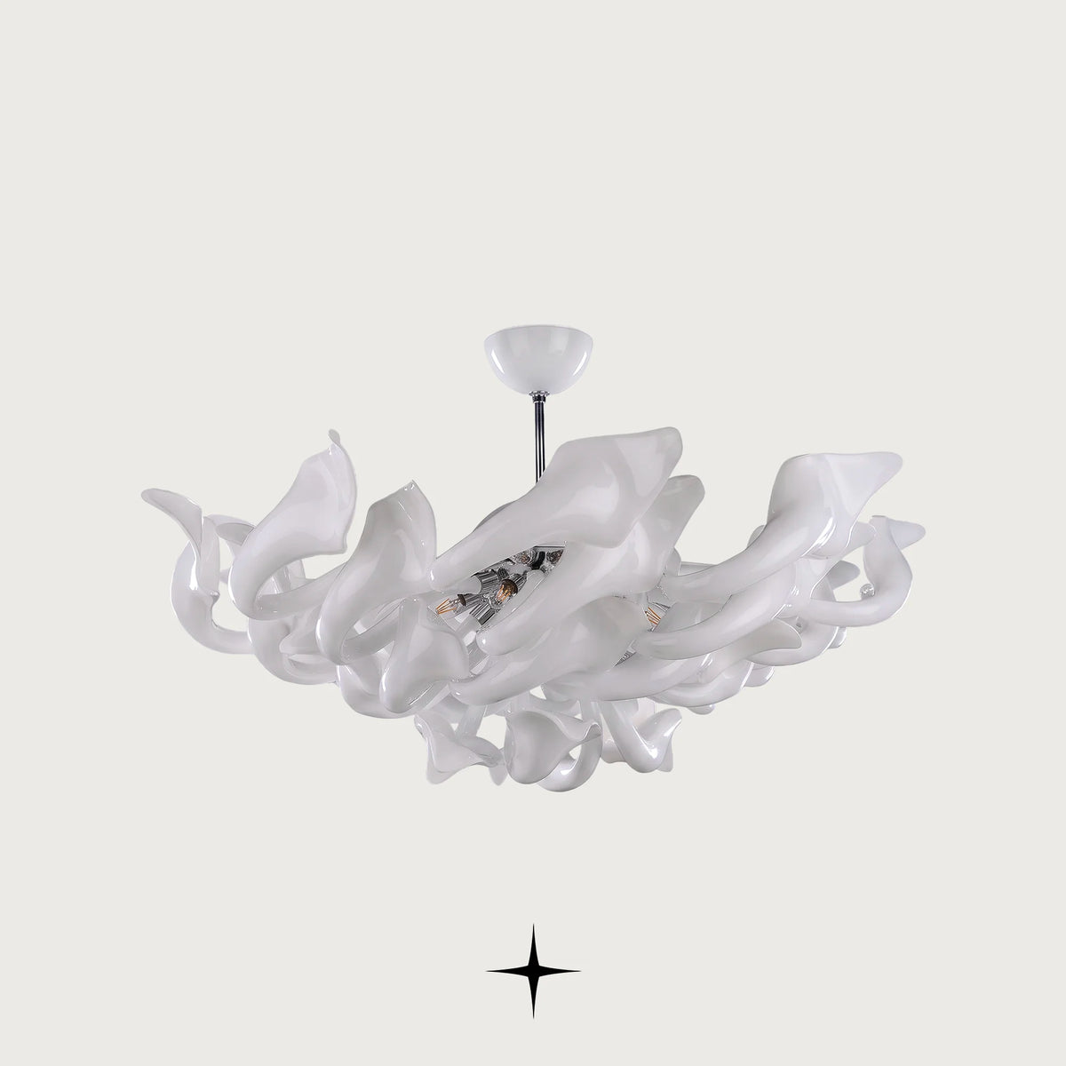 Lavish Naria Chandelier featuring chic elongated white crystal arms in multi-tier configurations