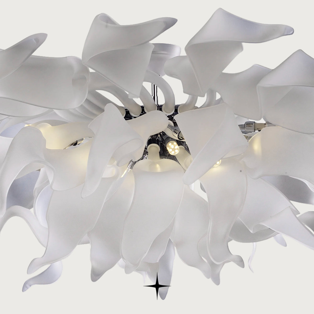 Lavish Pearl Chandelier featuring a symphony of dancing crystals in white and silver across three sizes