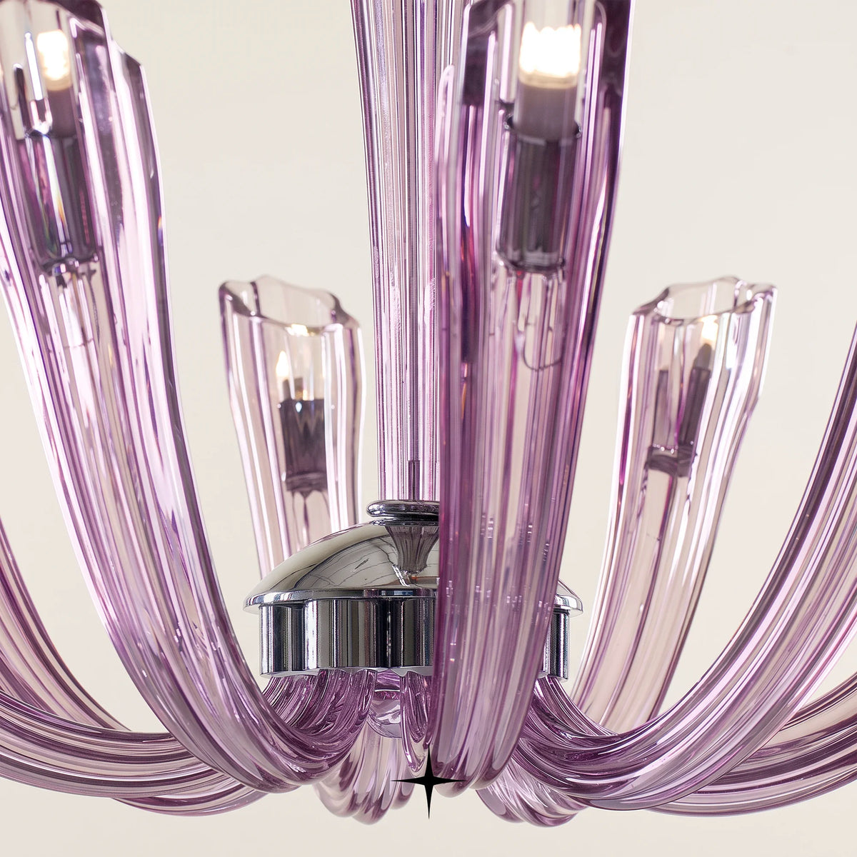 Sienna Chandelier featuring chic elongated crystal arms in a stunning luxury purple finish