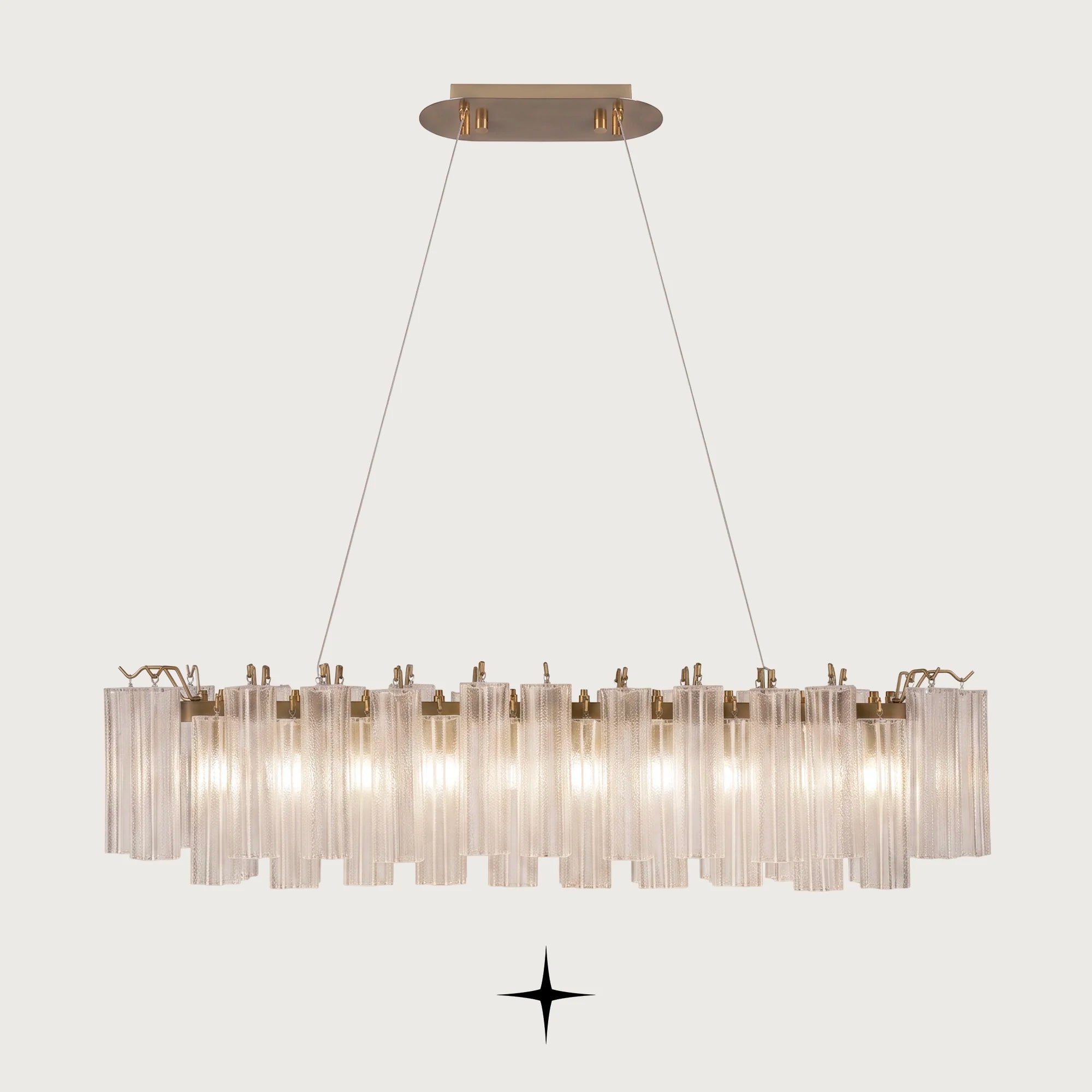 Linear Astra horizontal brass chandelier with fluted ribbed glass tubes on light grey background
