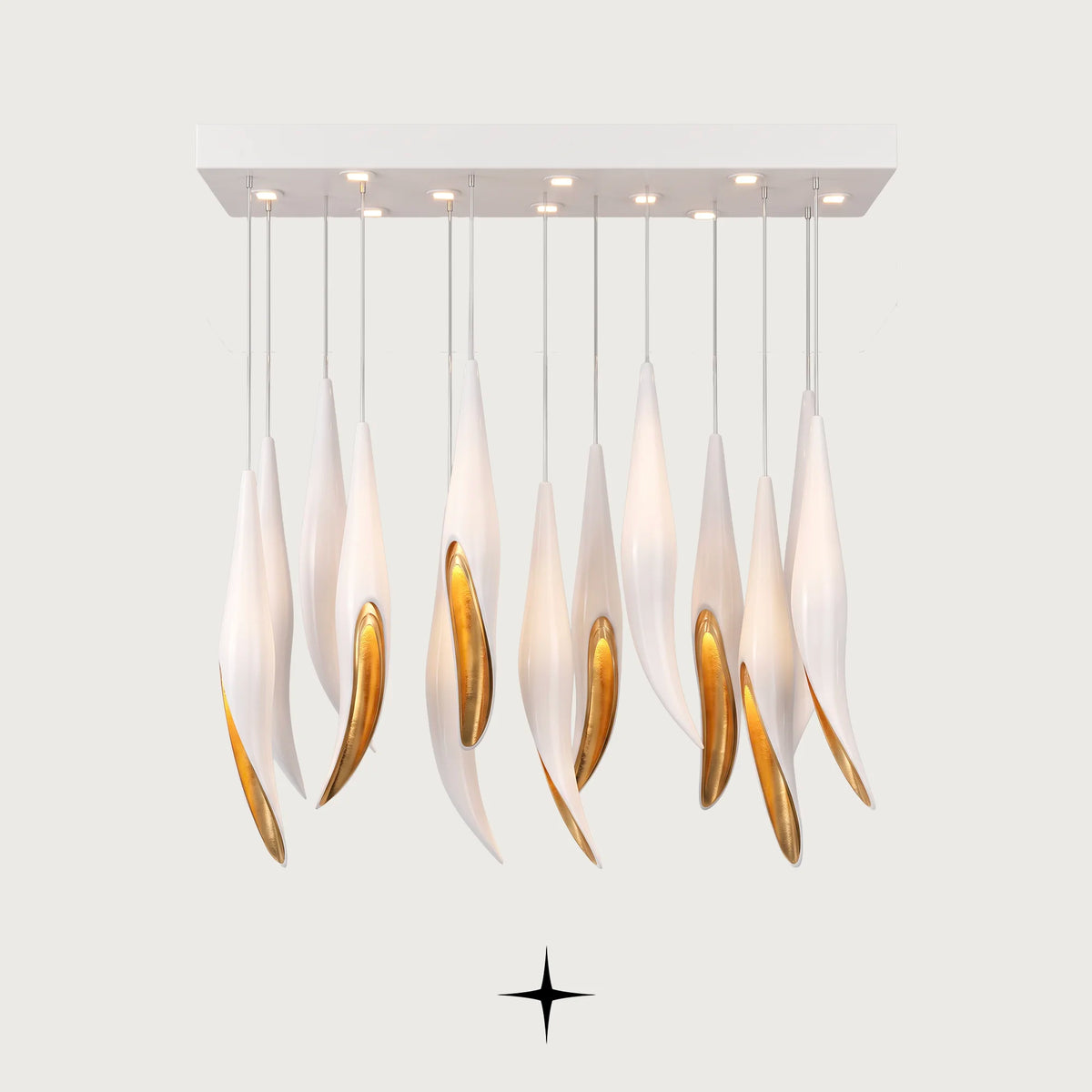 Linear Bella chandelier featuring cascading white flowers adorned with a brilliant heart of gold