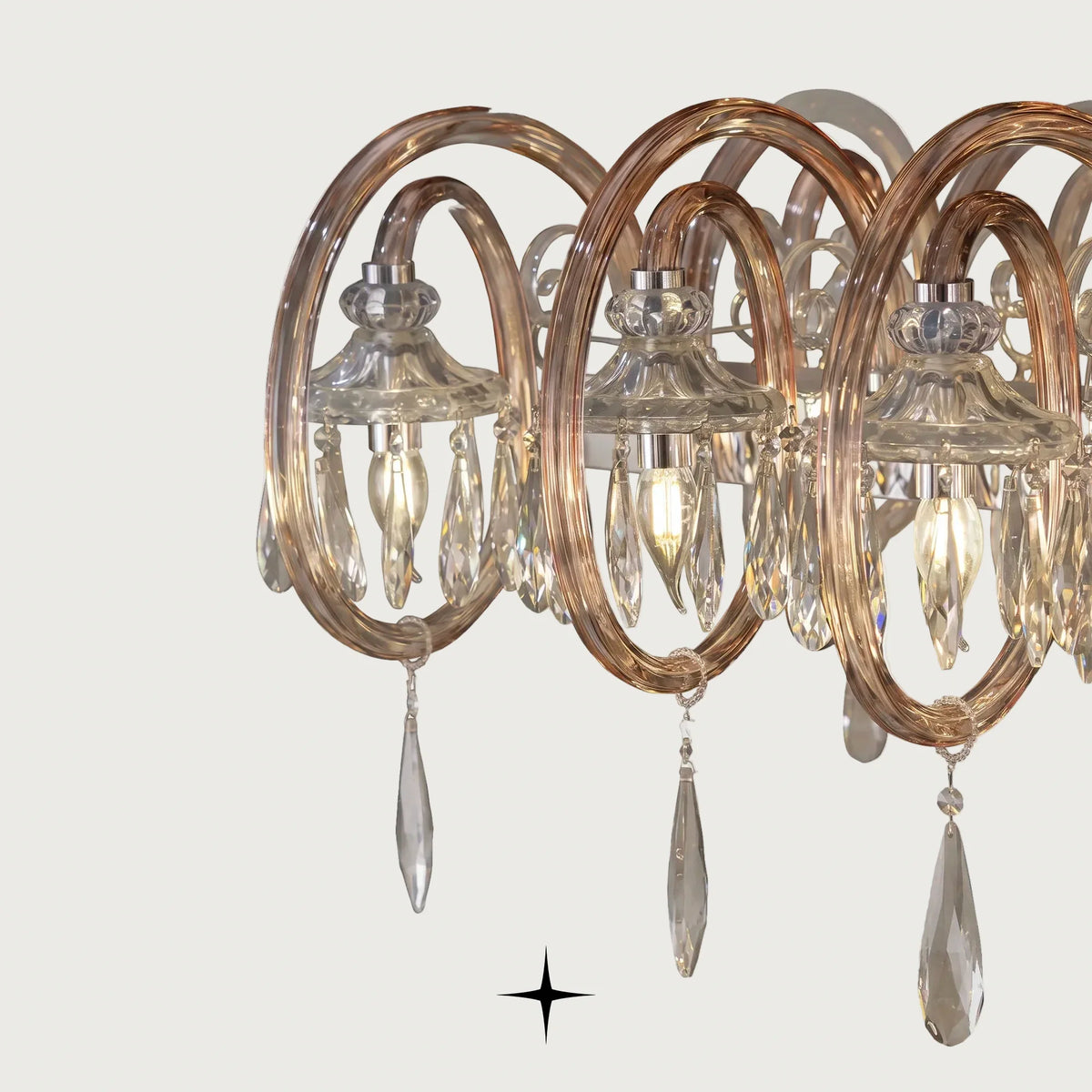Close side angle of Linear Elegance horizontal alloy chandelier on light grey backdrop