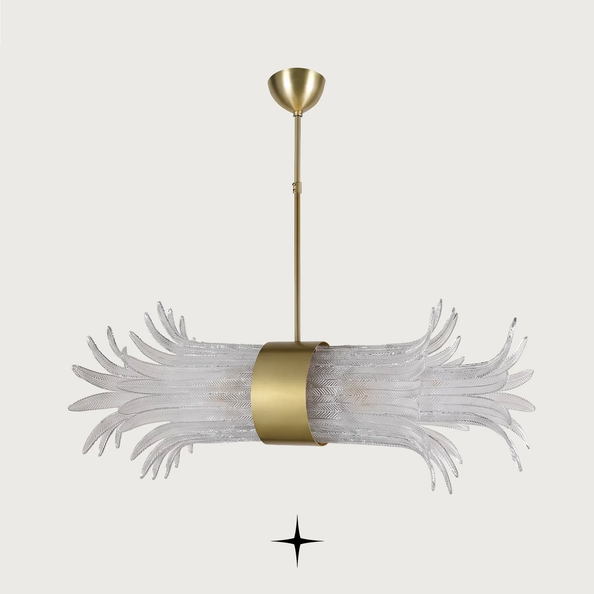 Linear Golden Falls chandelier with hand-blown glass feather diffusers and brass ring centerpiece
