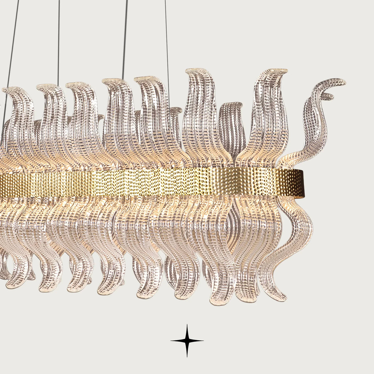 Linear Helena chandelier featuring handcrafted Murano glass leaves and gold frame on black background