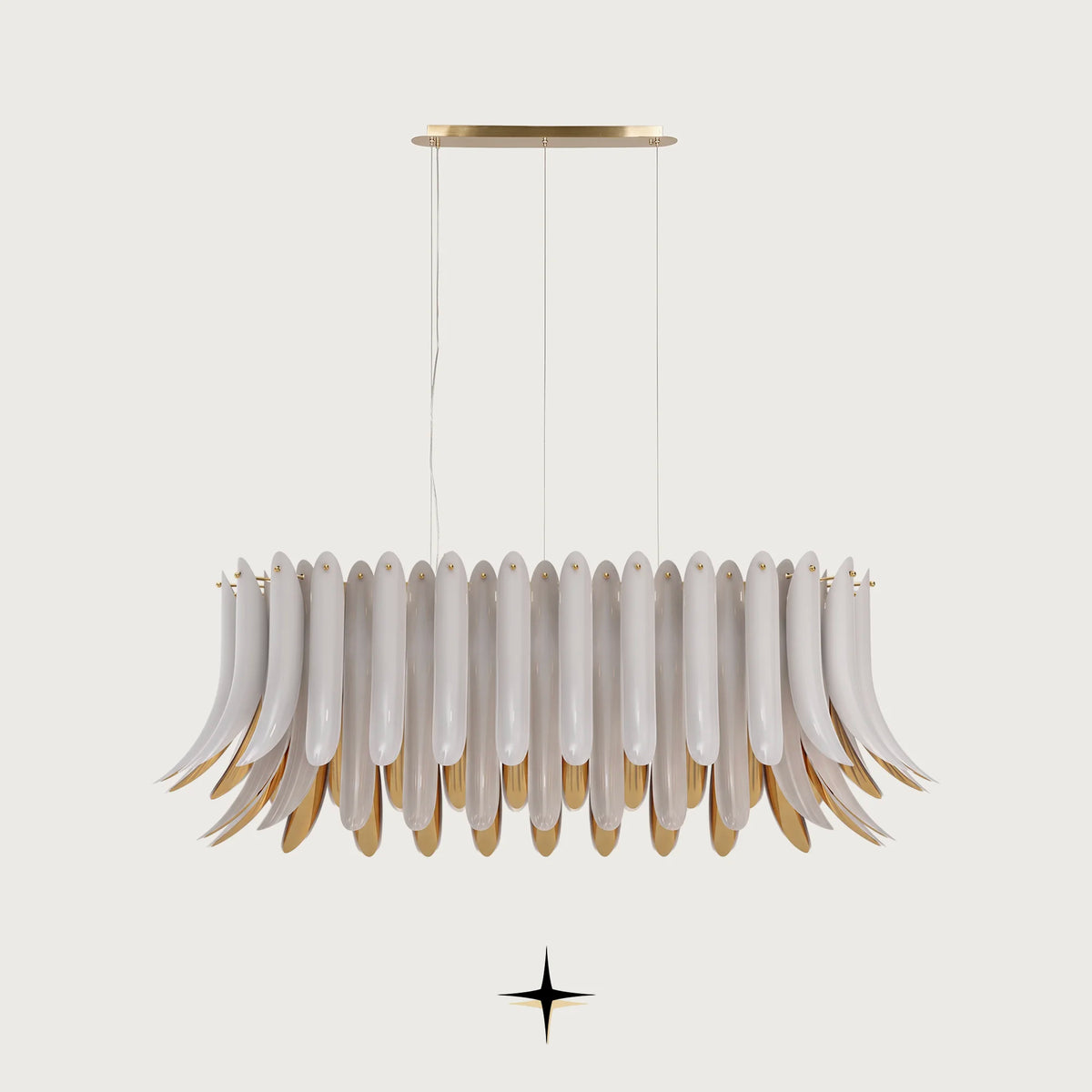 Linear Juliette chandelier featuring handcrafted crystal wings with white exteriors and golden interiors