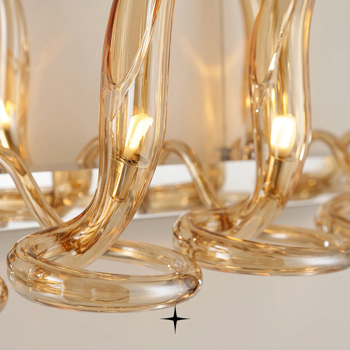 Linear Lumina chandelier featuring fiery crystal flames and vibrant orange hue in a sleek linear design
