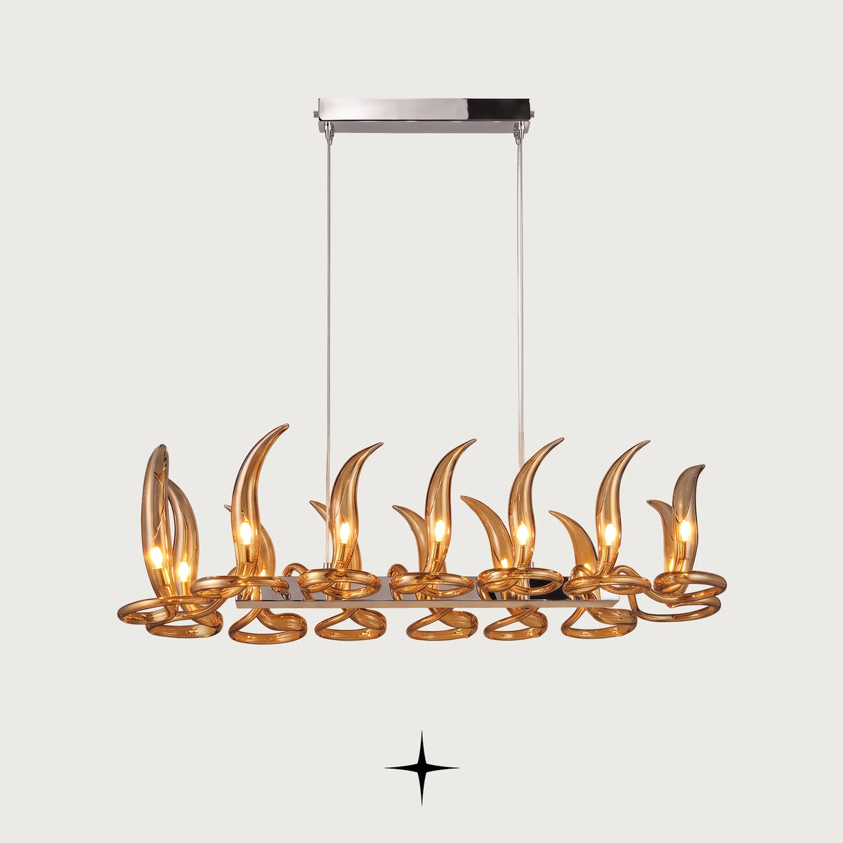 Linear Lumina chandelier featuring fiery crystal flames and vibrant orange hue in a sleek linear design