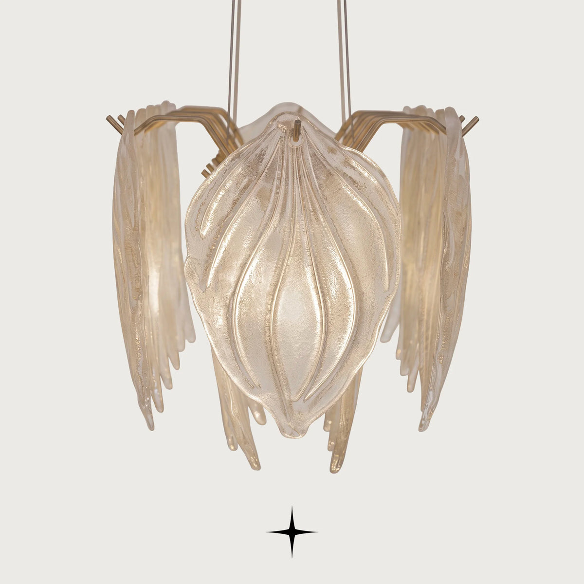 Side profile detail of leaf shaped textured glass elements on Linear Mellow chandelier