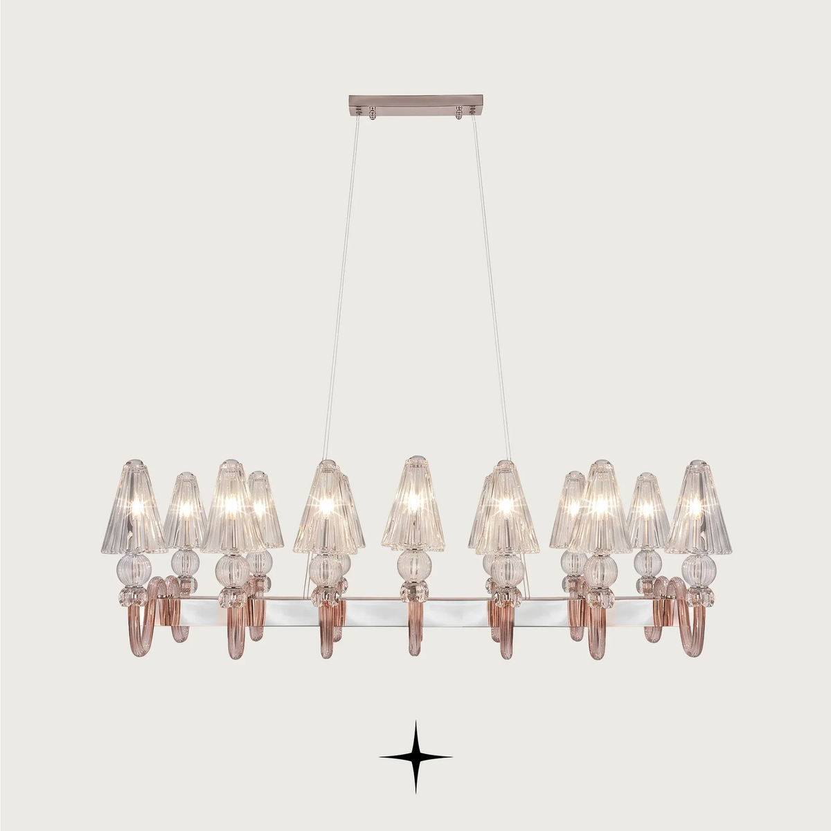Linear Muse crystal chandelier suspended over a modern luxury dining space