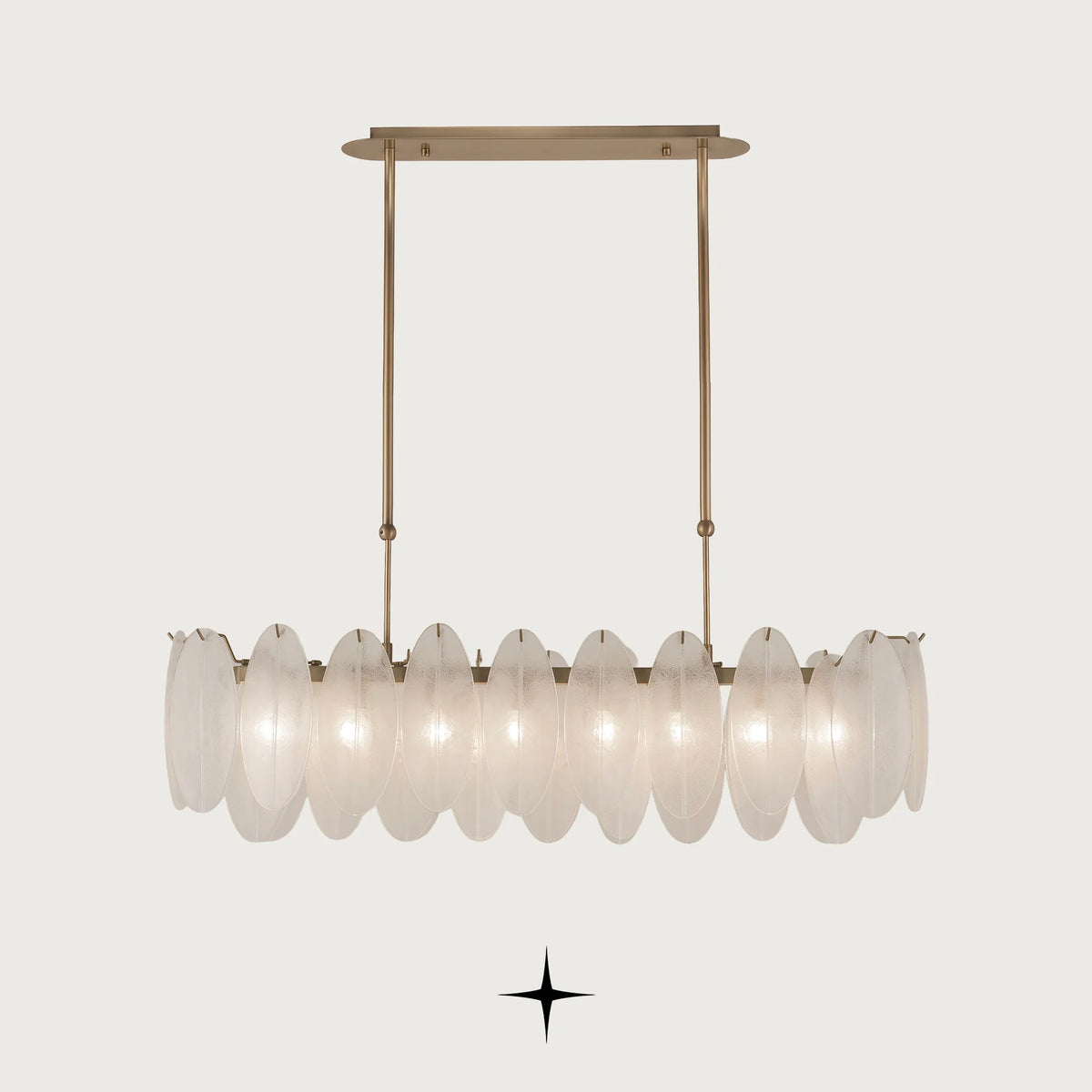 Linear Serene chandelier featuring oval crystals and a radiant golden structure