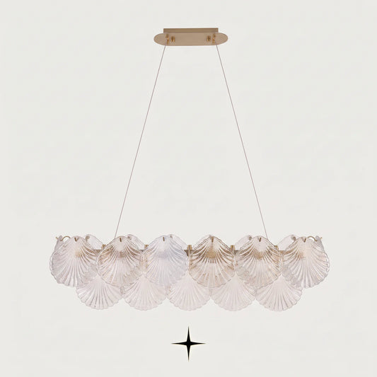 Front view of Linear Shellina coastal seashell glass island light fixture on light grey backdrop