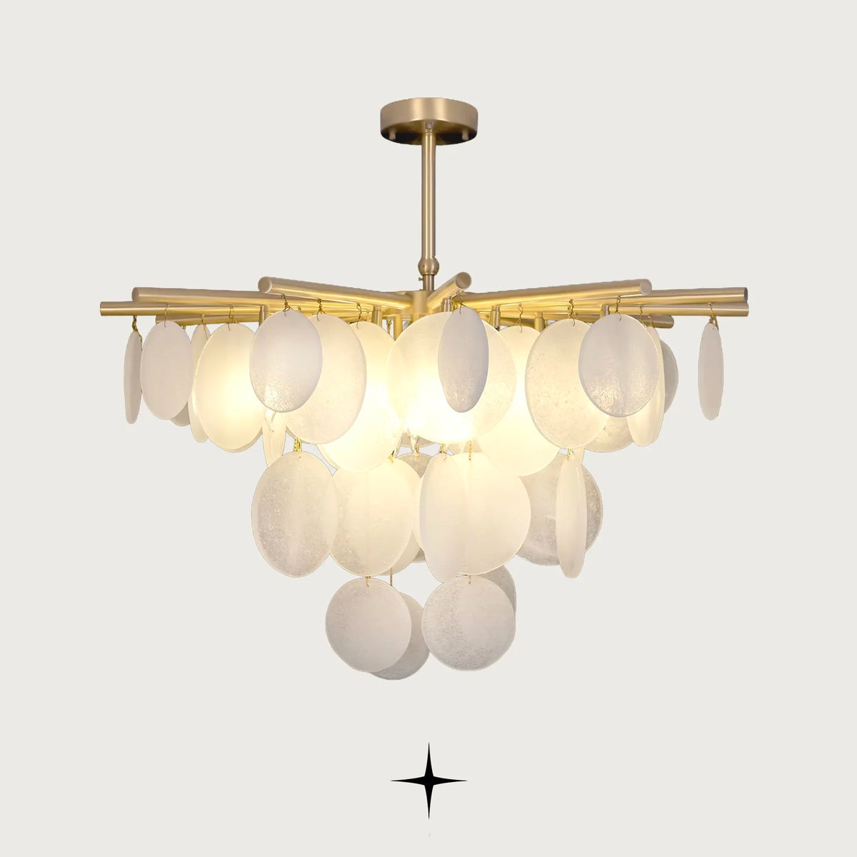 Lunaria Chandelier featuring frosted glass discs suspended from a high-quality alloy frame with brass accents in a luxury design