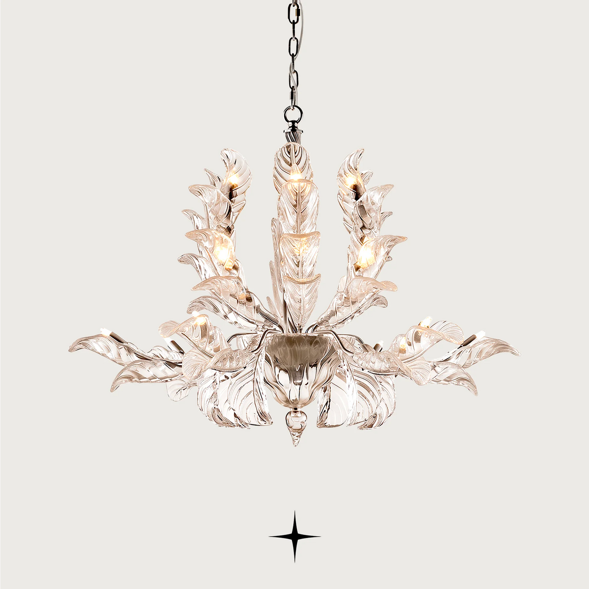 Madam luxury crystal chandelier displaying clear Murano-style glass leaves on a gold hanging frame