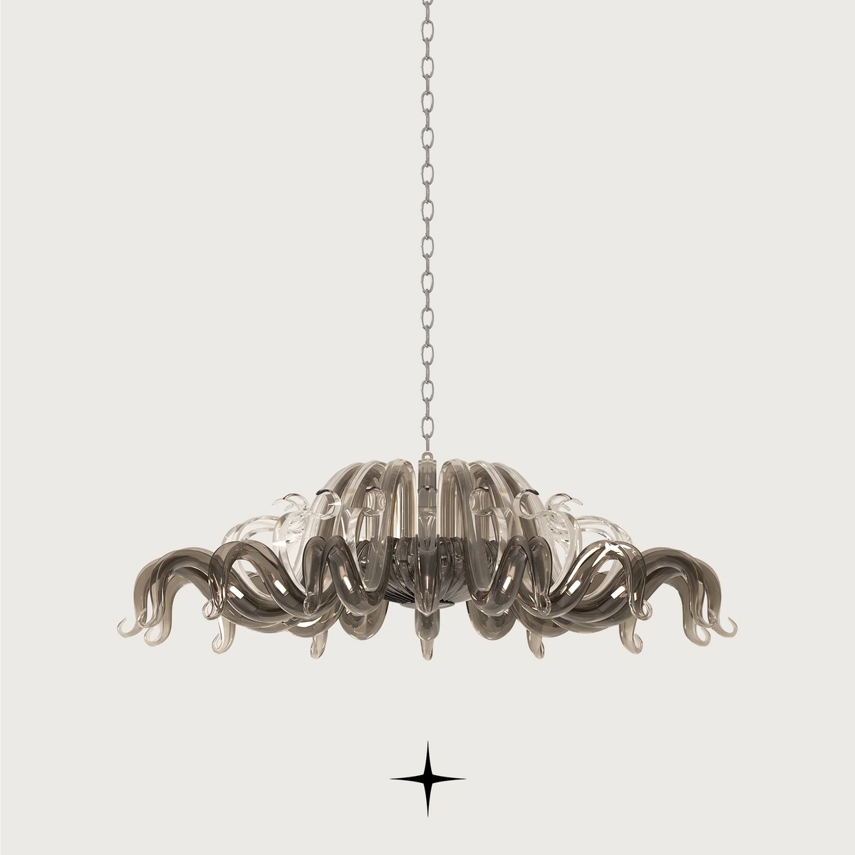Majesty Chandelier featuring long curved clear dark crystal glass and 21 G9 LED lights.