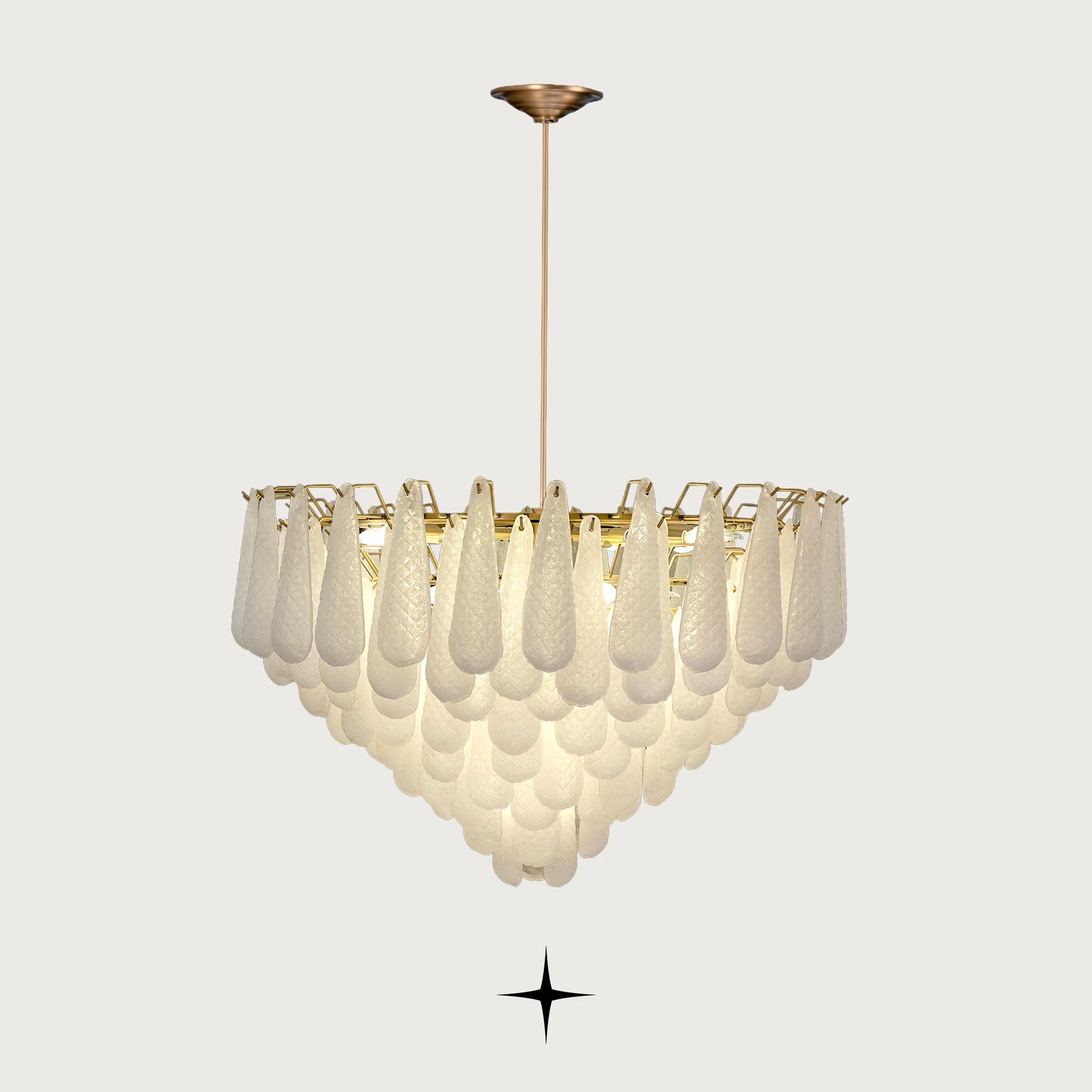 Miranda cascading textured glass droplet chandelier with gold stem on light grey background