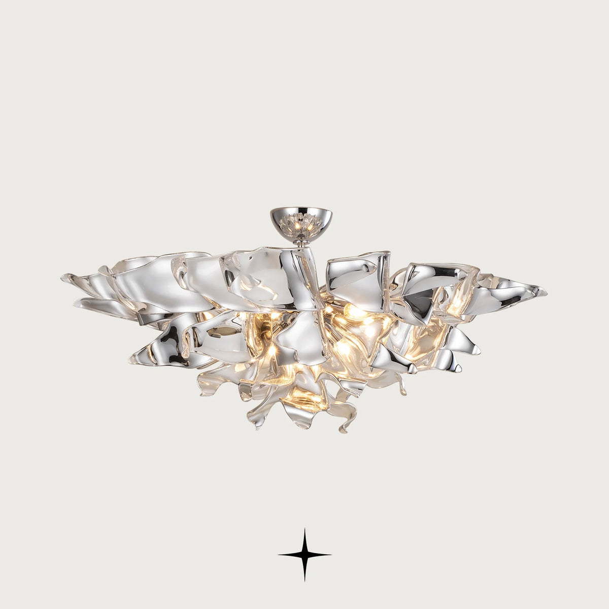 Naria Chandelier featuring chic elongated champagne crystal arms in multi-tier configurations