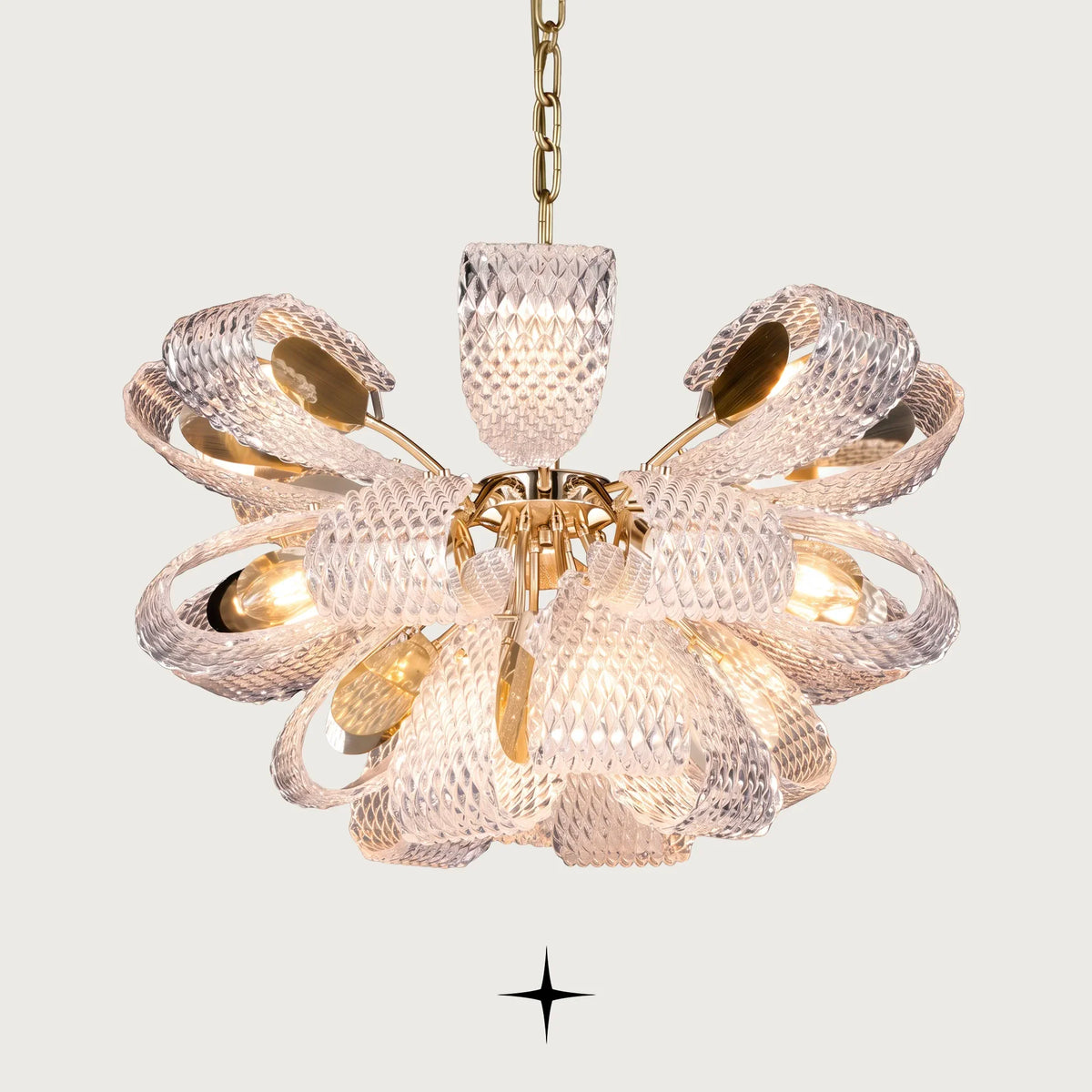 Papiyon Chandelier featuring intricately textured crystal petals and polished golden hardware in a luxury design